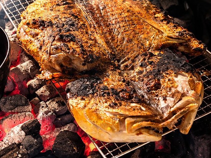 Whole fish grilled over real charcoal